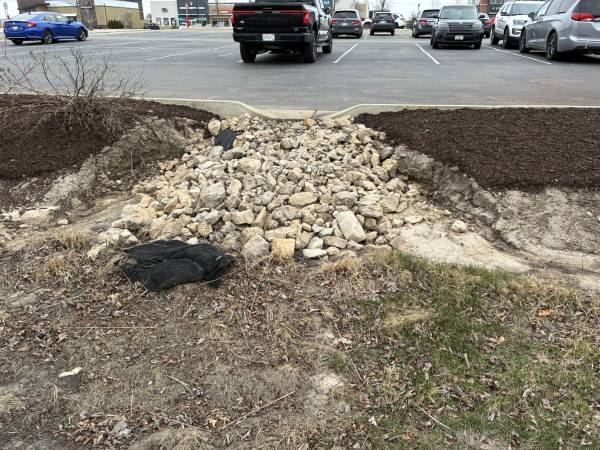Erosion around riprap from improper shaping